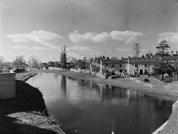 VIEW OF TOWN AND RIVER FROM BRIDGE